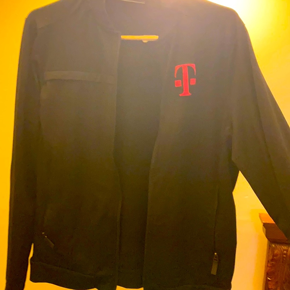 COPY - Womans zip up T-mobile sweater. Size Medium.